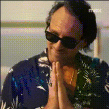 Man In Sunglasses Gesturing
