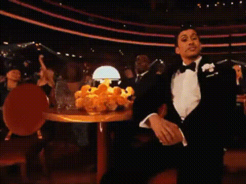 Man In Tuxedo Laughing