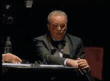 Man In Tuxedo Sitting