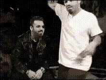 Man In White Shirt Performs
