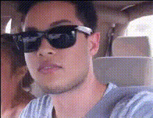 Man Makes Kiss Face In Car