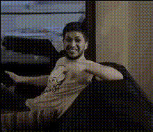 Man On Couch Smiling