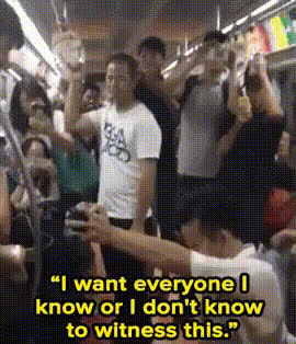 Man On Crowded Train