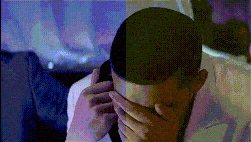 Man On Phone Looking Sad
