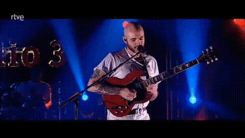 Man Playing Electric Guitar