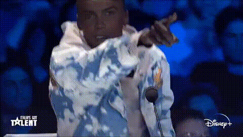 Man Pointing On Talent Show
