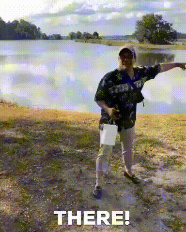 Man Pointing Outdoors