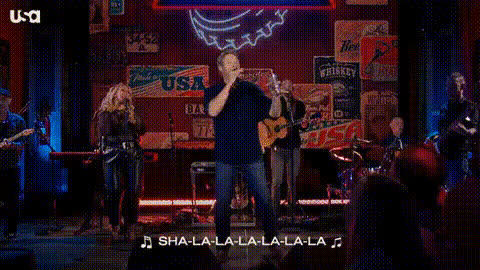Man Singing On Stage (2)