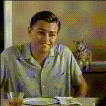 Man Sitting At A Table