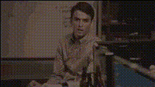 Man Sitting In Classroom