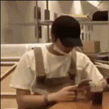 Man Sitting At Table