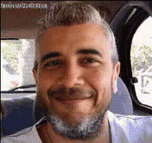 Man Smiling In Car