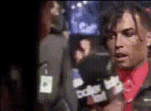 Man Speaking To Microphone