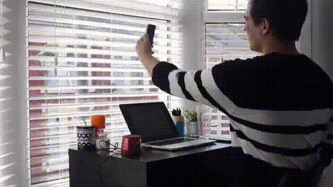 Man Taking Selfie At Desk (2)