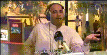Man Talking On Microphone