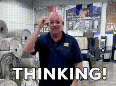 Man Thinking In Store