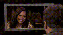 Man Watches Woman Smile