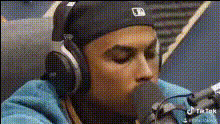 Man Wearing Headphones Singing