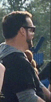 Man Wearing Sunglasses Pointing