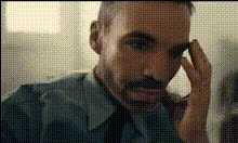 Man With Hand On Forehead
