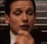 Man With Hand On Face