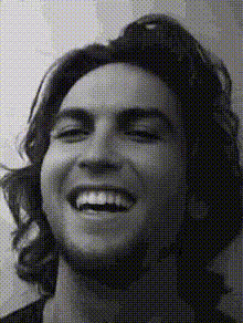 Man With Long Hair Laughing