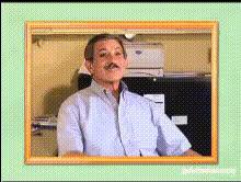 Man With Mustache Sitting Desk