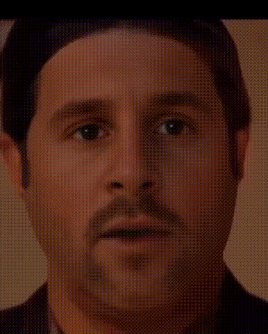 Man With Mustache Looks Surprised