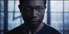 Man With Red Eyes Stares