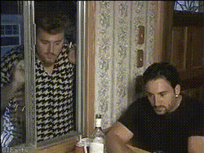 Men Arguing At Table