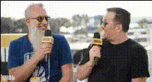 Men Holding Microphones