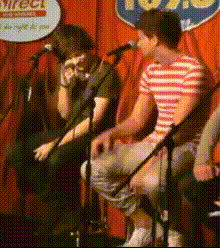 Men On Stage With Mics