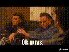 Men Sitting On A Couch