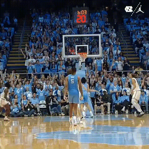 Ncaa Basketball Player In Action