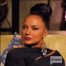 phaedra-parks-smiling-on-couch