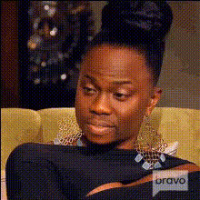 phaedra-parks-talking-on-couch