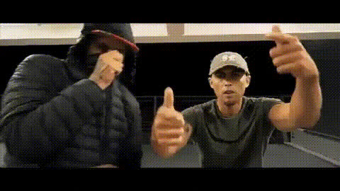rapper-jaykae-and-friend-gesture
