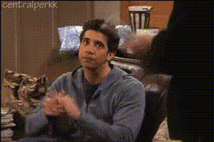 ross-geller-smiling-sitting