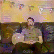 serious-man-on-couch