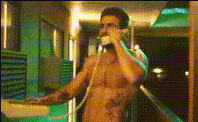 shirtless-man-on-phone