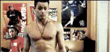 shirtless-man-with-posters