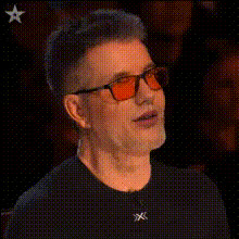simon-cowell-smiling-with-sunglasses
