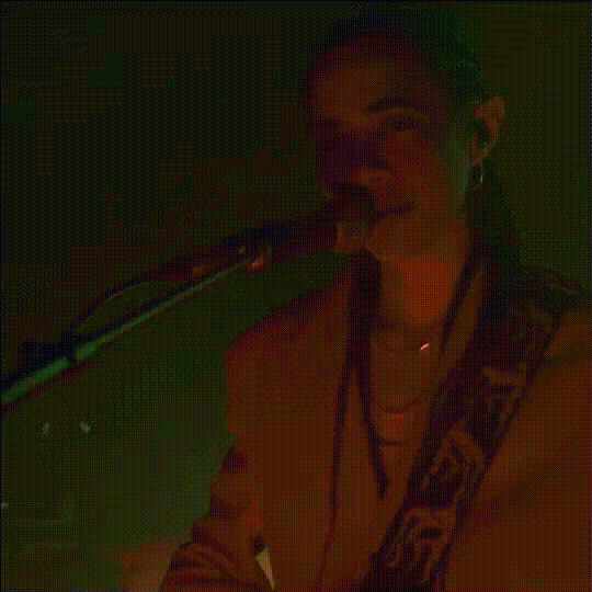 singer-with-mic-and-guitar