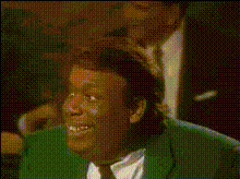 smiling-man-in-green-suit