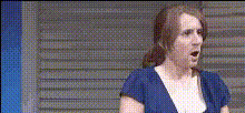 surprised-woman-in-blue-dress