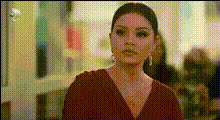 surprised-woman-in-purple-dress