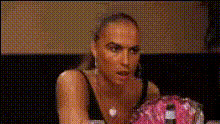 tamar-braxton-sitting-at-table
