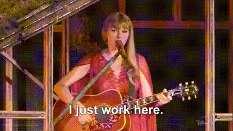 taylor-swift-singing-guitar