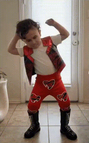 toddler-flexing-muscles-proudly