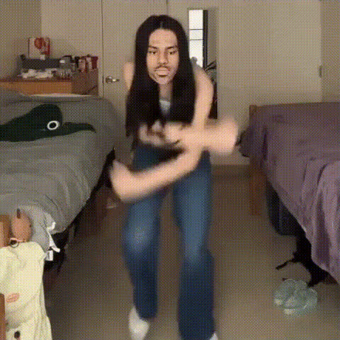 woman-dancing-in-dorm-room